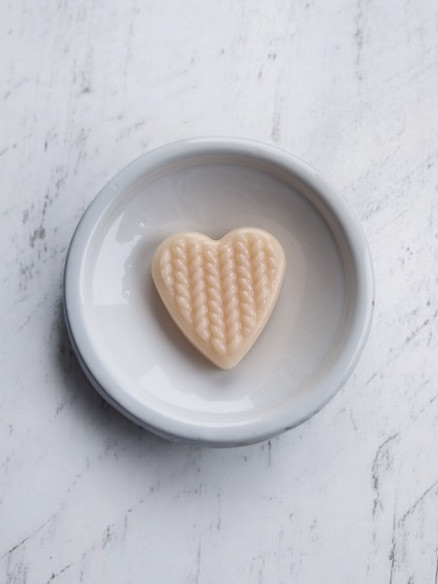 Spring wax/oil burner